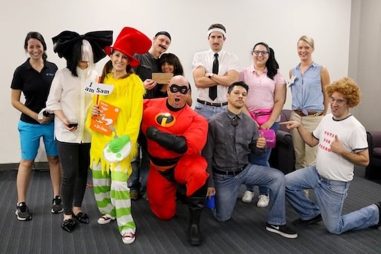 a group of people in various costumes