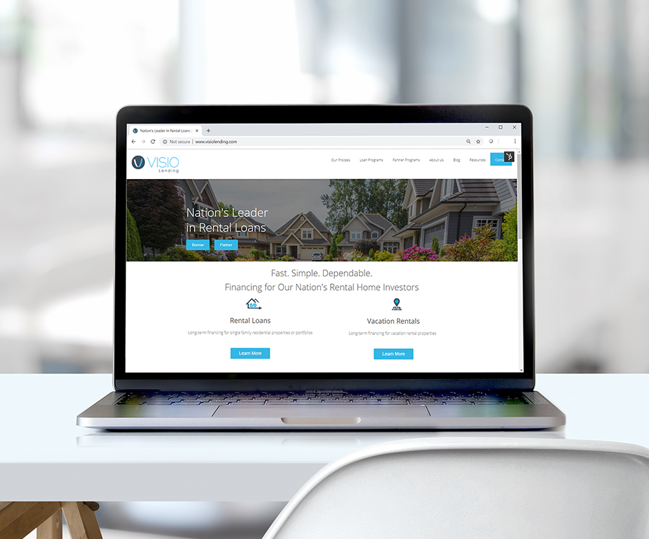 laptop with Visio's website