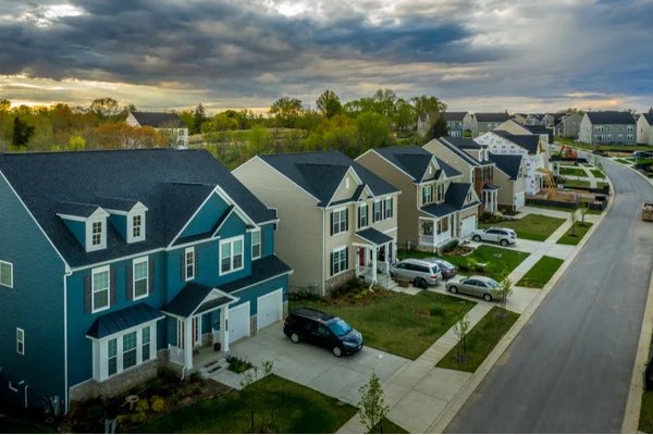 suburban street with houses on either side